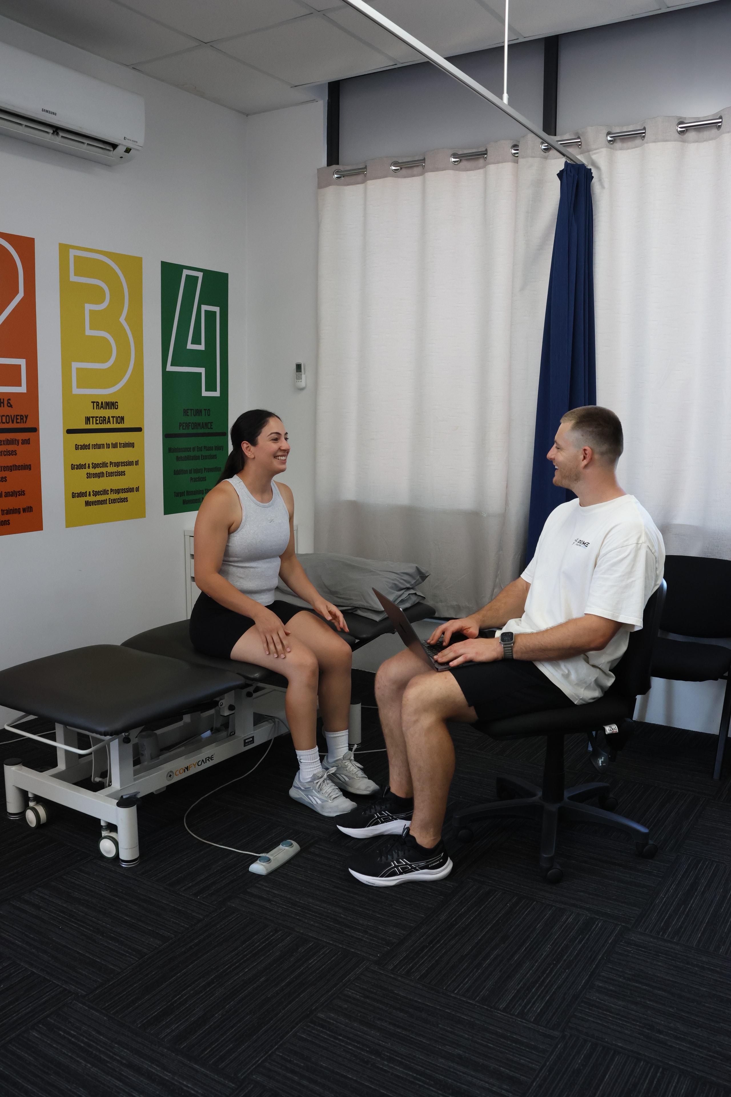 Physiotherapist treating neck and back pain